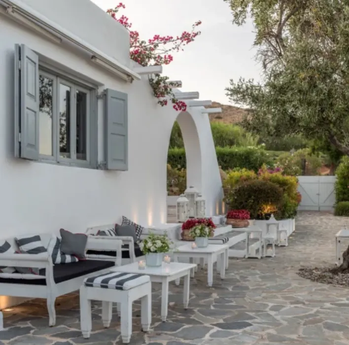 Residence courtyard beneath flowering bougainvillea