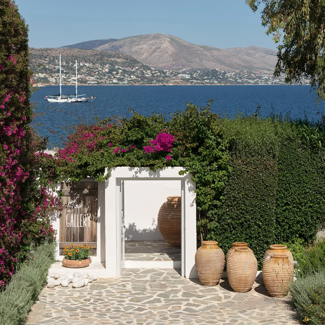 Entrance overlooking a sailboat and the bay